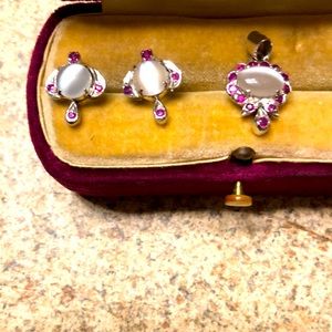 Stunning genuine rubies, and moon stones set in sterling silver.